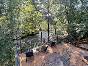 Take a seat on the lower deck and enjoy the soothing sounds of rushing river