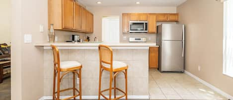 Kitchen bar counter with seating for 2