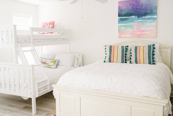 Bunk + Queen Combo Room with Private Balcony. 