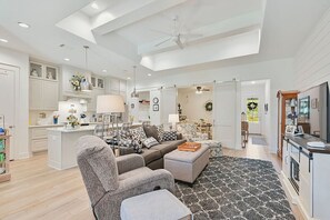 Where the heart of the home flows seamlessly—this living room and kitchen combo is perfect for gatherings.