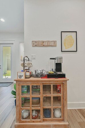 A fully stocked coffee station with festive mugs, ready to brew your perfect cup of joy.