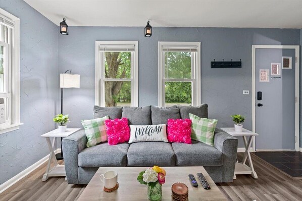 Beautiful Living Room Setup with home workstation / coffee table.