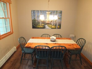 OVERVIEW:  The dining room with table and chairs for 6 adults.