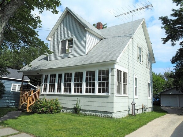 EXTERIOR:  Nice overview of the front of the house.