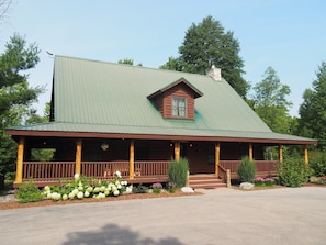 OVERALL:  The front of the cabin in summer.