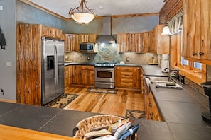 OVERALL:  Huge kitchen with all stainless steel appliances.
