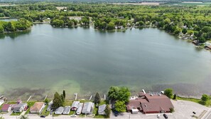 OVERALL:  A broad view of Turk Lake with the cottage and restaurant in front of the lake