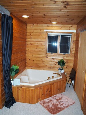 OVERALL:  The jetted tub in the large upstairs bedroom.