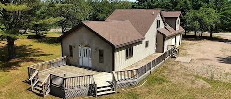 OVERALL:  A good aerial photo highlighting the privacy of the property and the large deck