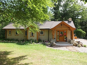 EXTERIOR: Looking directly at the front of the house.