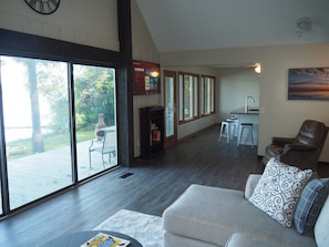 OVERVIEW: The living room features great natural lighting and gorgeous views of Bass Lake!