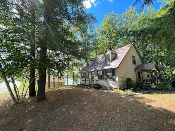 OVERALL:  The cabin, highlighting the large front yard and Little Twin Lake in the background