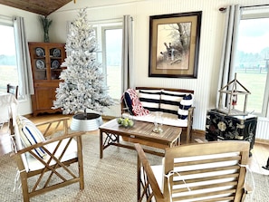 Take in the wintry landscape from the warmth of the sunroom.