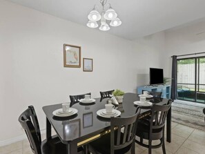 Dining room area next to living room