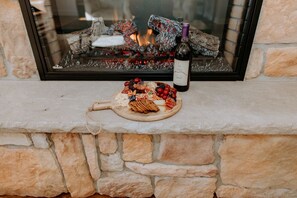 Enjoy quality time by the fireplace.