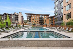 The pool (with a water slide!) and hot tubs at Electric Pass Lodge!
