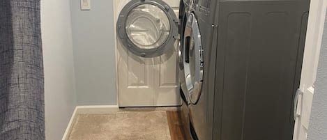 Large washer and dryer. Can easily fit a comforter and bedding