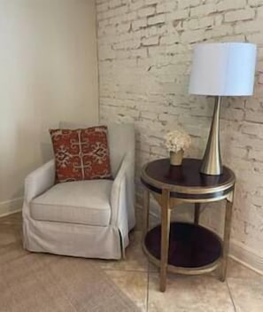 Comfy chair with lamp for a quite reading nook.