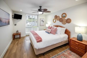 Indulge in luxury and comfort with a king-size bed and an ocean breeze