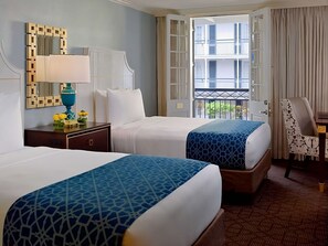 Unit with 2 Double beds. Exact unit will be assigned upon arrival. Views, colors, and decor may vary.