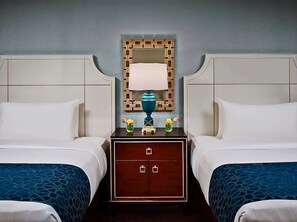 Unit with 2 Double beds. Exact unit will be assigned upon arrival. Views, colors, and decor may vary.