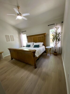 Master bedroom featuring a split king adjustable bed.