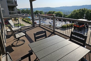 9' x 21' Private Covered Deck, Overlooking the pool. Table/Chairs for Four.