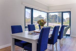 Enjoy family meals with a view at the 6 seater dining room table.