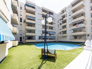 Building, Window, Swimming Pool, Water, Urban Design, Tower Block, Condominium, Neighbourhood, Residential Area, Plant