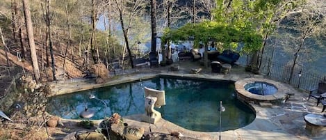 From the backporch looking over the pool, hot tub, and Lake Tuscaloosa