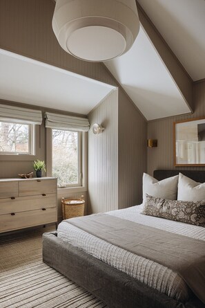 This bedroom's design, furnishings and view proclaim - Comfort and Elegance.