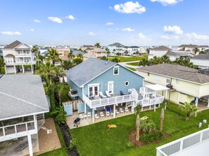 Entertainment on all sides of the house - dine, relax, play, grill.