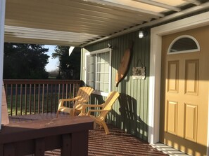 Covered front porch for enjoying morning coffee or just taking in the salt air