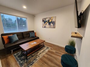 Living area on the second floor with a queen size futon. No door on this room