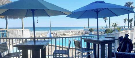 On Site Tiki Bar & Grille overlooks pool, hot tub & has direct beach access!