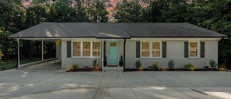 Front home with circular driveway