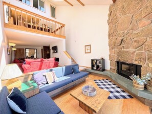 Open-style loft layout means ample natural light throughout the home.