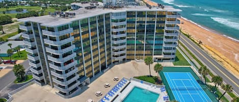 Nautilus Condo Features A Community Pool, Tennis Court, Picnic Tables, Shuffle Board & Endless Miles Of Beach