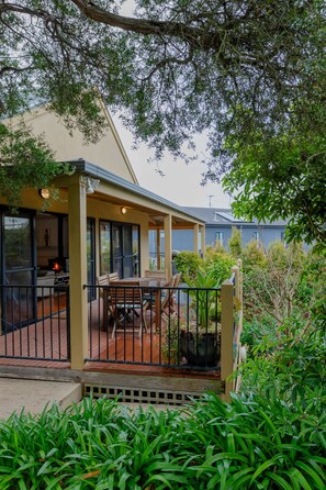 Feel like your above the trees and enjoy the sea air on the elevated deck