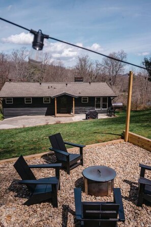 Cozy up by the fire pit in the evenings!