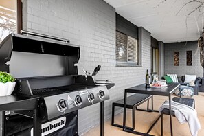 Outdoor lounge area.  A great place to sit back and relax with a board games, BBQ, comfortable outdoor dining and fulling enclosed yard