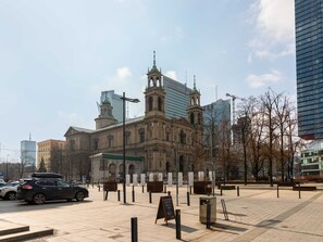 A scenic view of the nearby city area, featuring iconic architecture and vibrant surroundings.

