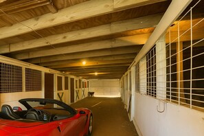 Up to 4-5 vehicles can fit in the dirt floor barn