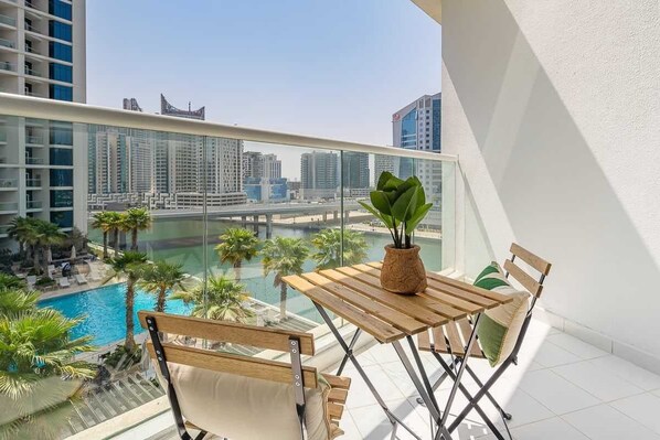 Balcony with Pool and Canal Views