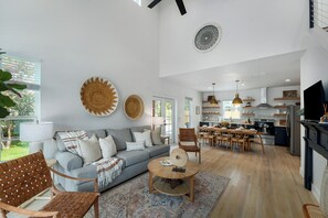 Spacious living room opens up to the kitchen and dining area.