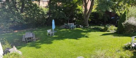 Best yard in the village- perfect for entertaining. Bring bug spray!