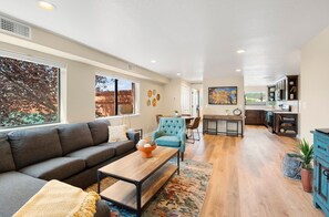 open kitchen, dining and living room areasd