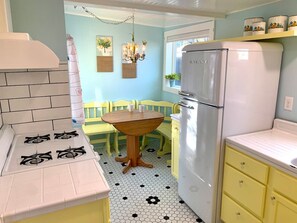 Dining Nook and Kitchen fully stocked with all the essentials