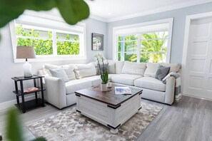 Take your shoes off and stay awhile in this bright living room with plenty of natural sunlight!
