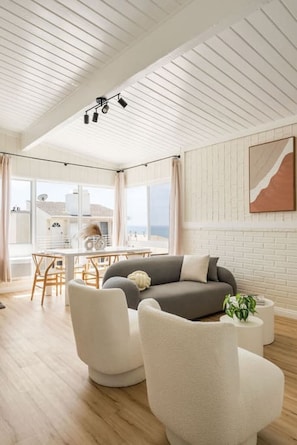 Relax in a stylish living area with breathtaking ocean views.